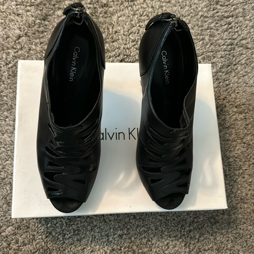 Sexy black peep toe bootie